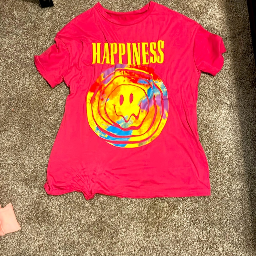 Pink “happiness shirt” in size women’s medium